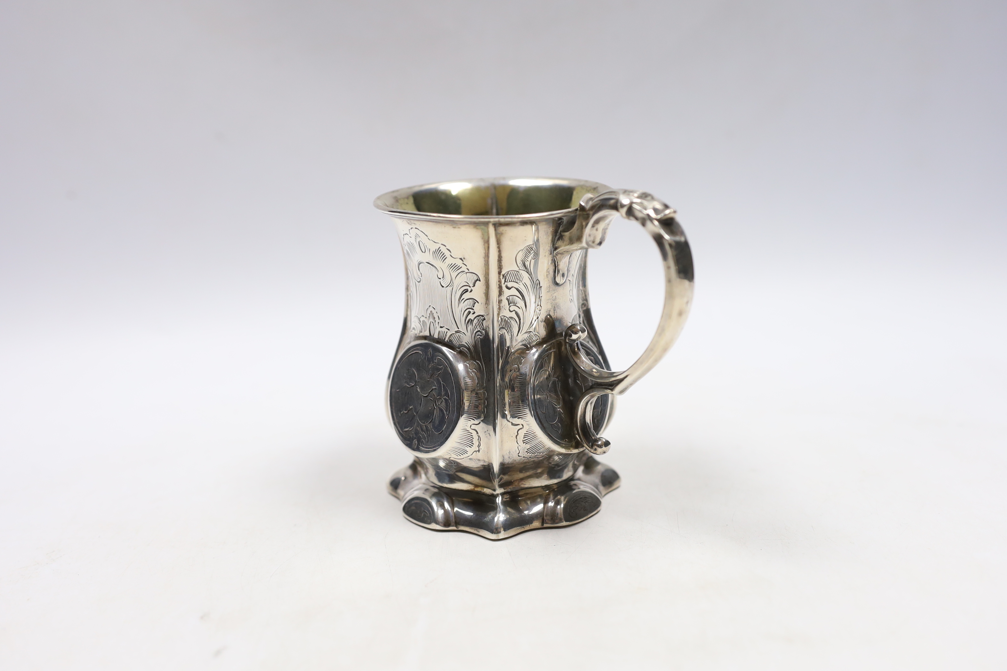 A Victorian engraved silver christening mug, George Unite?, Birmingham, 1857, 10.2cm.